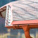 Metal roofing gutters