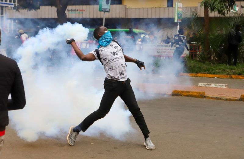 Protester threw tear gas canisters back