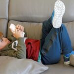 Children playing with mobile phones