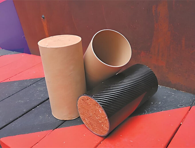 Low-carbon building materials: cardboard and soil