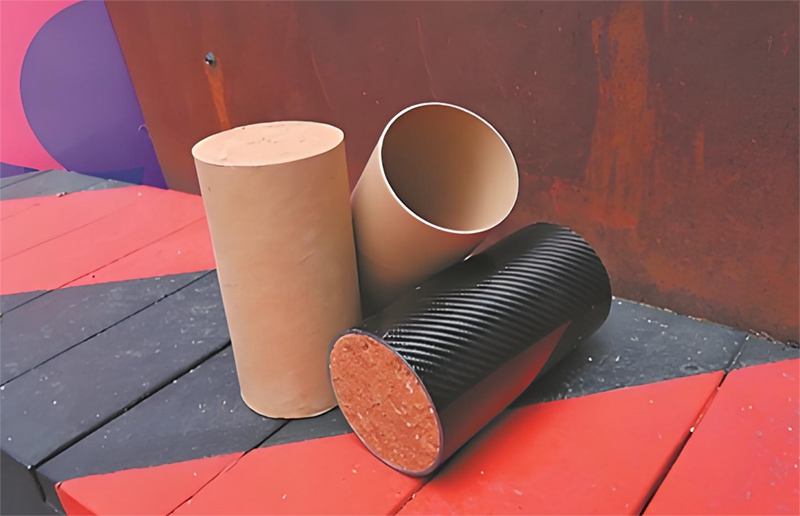 Low-carbon building materials: cardboard and soil