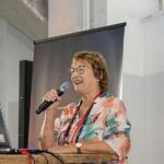 Woman speaking at a conference