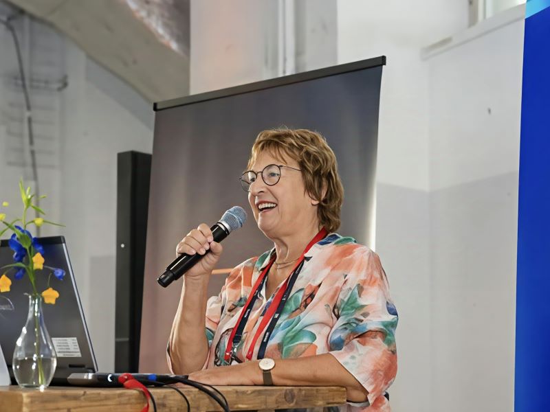 Woman speaking at a conference