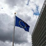 European union flag with a building