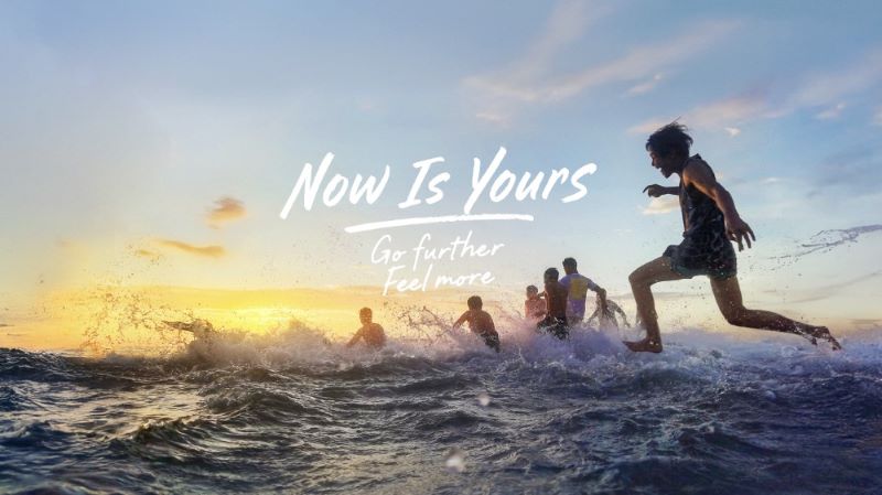 People playing in ocean waves