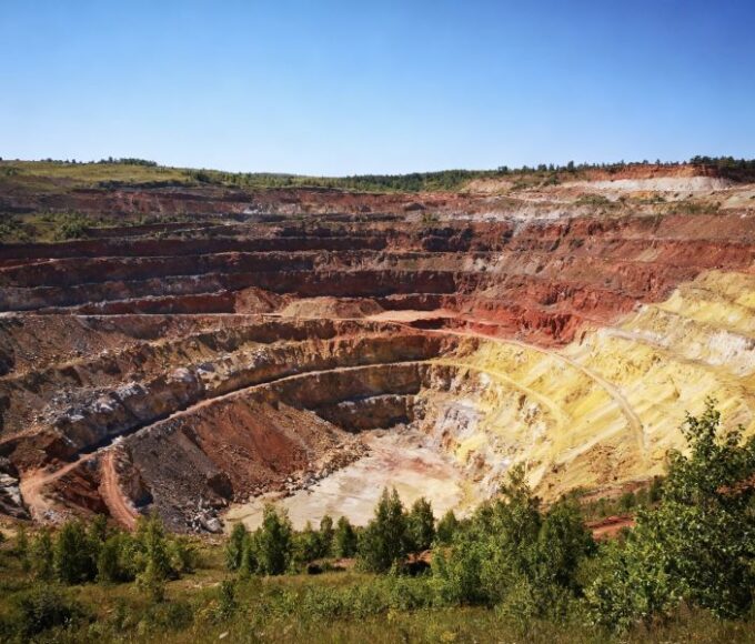 Colorful layered open-pit mine landscape
