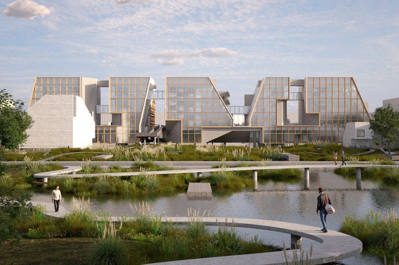 Modern architectural complex with glass facades and landscaped water features