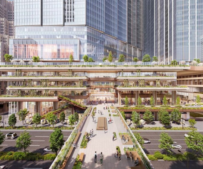 Multi-level urban complex with green terraces and pedestrian walkway