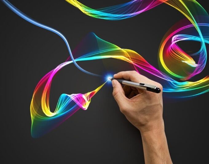 Hand drawing with colorful light trails from a pen